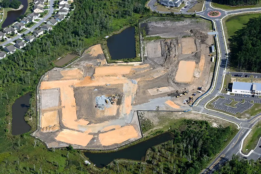 aerial view of a construction site with ground work in progress