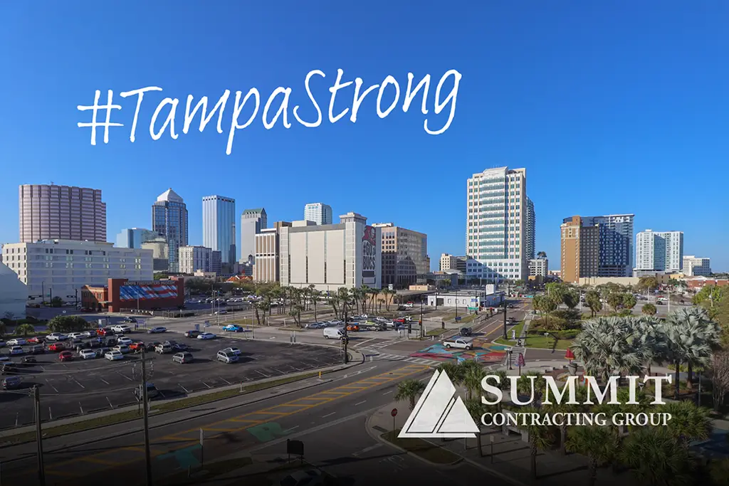 tampa skyline with tall buildings, tagline "#TampaStrong" and Summit Contracting Group logo